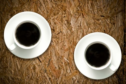 Coffee cup on grunge wood table, Retro concept