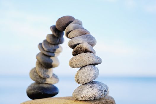 Arc crookedness of the pebbles on the background sky