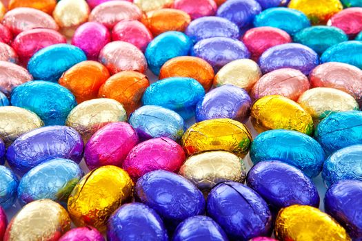 Background of colorful chocolate easter eggs