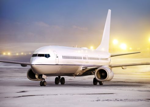 airport and white plane at non-flying weather, winter time