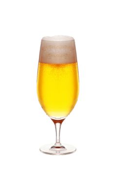 Glass of beer close-up with froth on white
