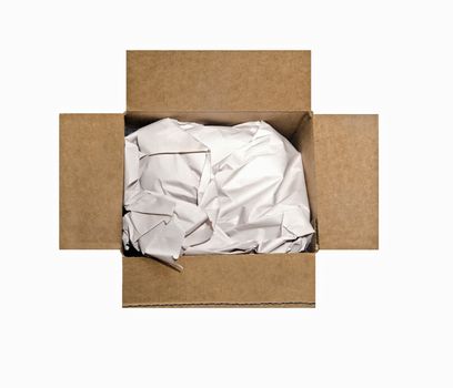 An open cardboard box filled with packing paper.