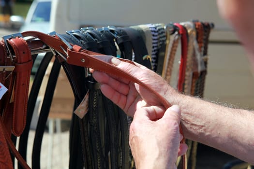 Man shopping for a leather belt