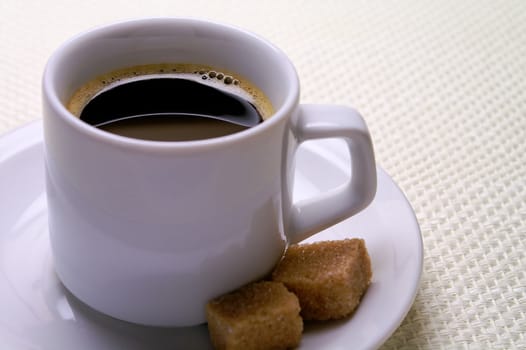 Coffee cup with sugar cubes