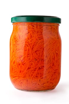 Glass jar of preserved julienne carrots  (vertical closeup)