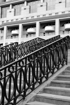 modern architecture. stairs with metal railing. vertical version