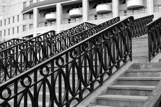 modern architecture. stairs with metal railing. horizontal version