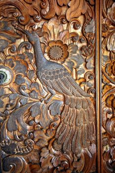 Wooden door decorated with a groove