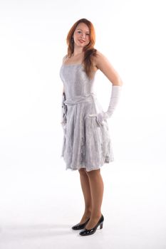 Young girl with white gloves standing on white background
