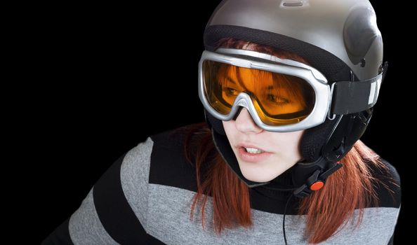 Portrait of a cute girl with red hair snowboarding on a winter background.

Studio shot, composite.
