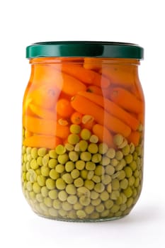 Glass jar of preserved peas and carrots  (vertical closeup)