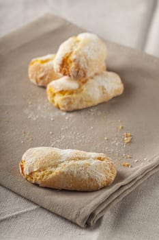 Close up of pastries over a beige tablelocth