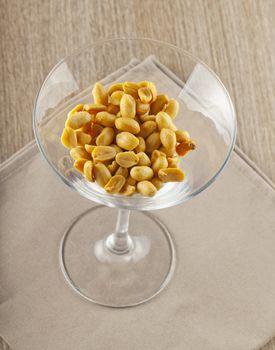 Close up of peanuts in an elegant glass