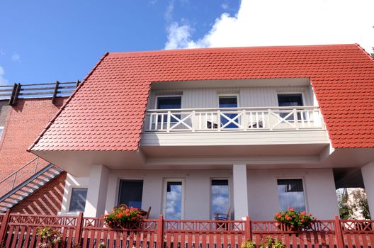 Private residential home architecture balcony windows of flowers.