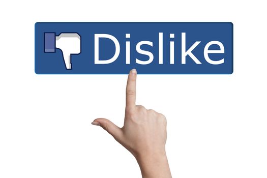 Hand pressing dislike button on white background