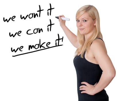 Businesswoman drawing an motivation concept on a whiteboard