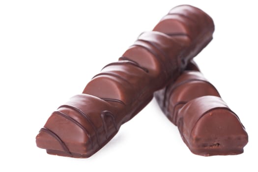 Closeup view of chocolate bar over white background