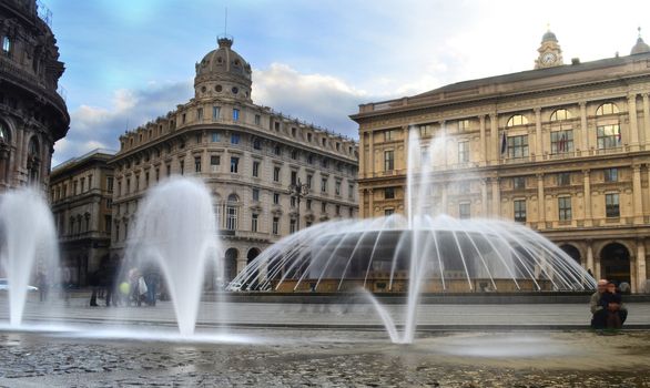 Fountain and palaces in Piazza De Ferrari in Genoa, Italy