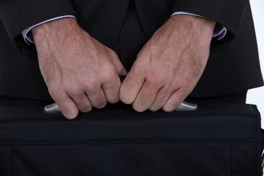 businessman holding a briefcase
