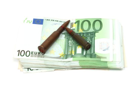 Bullets close up over euro bills 