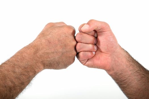 Two men bumping fists