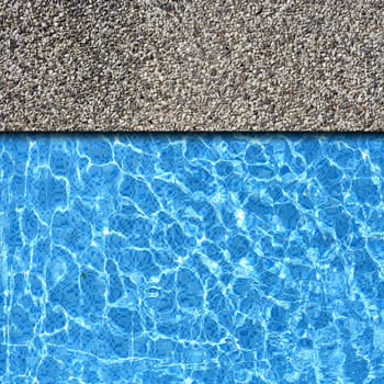 white sand stone pavement with pool edge background
