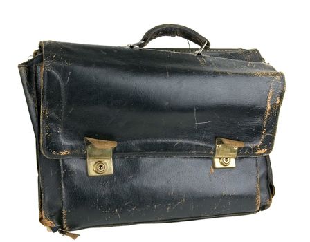 Old brown suitcase on a light background