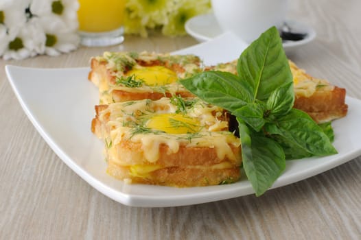 Toast with egg and cheese with dill and a cup of coffee