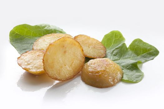 Some fried potato with fresh green lettuce