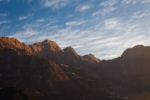 From Katra in Jammu Kashmir, side of the Trikuta peaks defining the 14 kilometer footpath and pony trail up the side of the mountain to Vaishno Devi Temple, a shrine and and popular Hindu pilgrimage