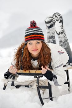 Young Beautiful Woman on sledge