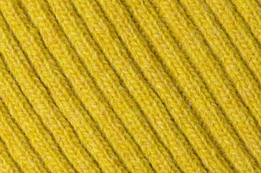Yellow wool texture, close up.