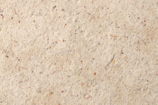 Recycled paper texture closeup background.