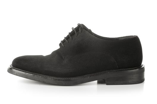 Black men's shoe on white background.