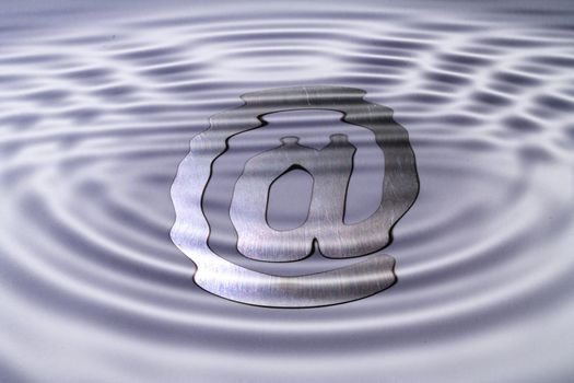 A web symbol under water symbolizing misty ways on the www.
