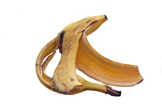 A banana peel lying on a white background.
