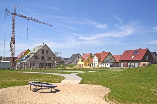 An area of new houses and construction yards.