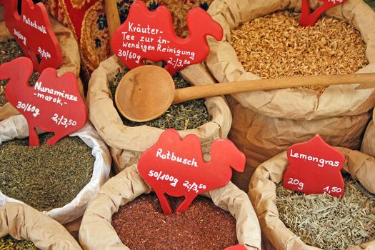 Different sorts of spice in old fashioned bags.