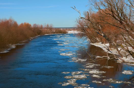 Winter river.Chunks of ice floating on the river in winter