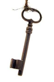 A close up of an old-fashioned metal key.