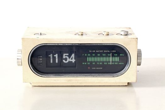 vintage clock radio set on old table