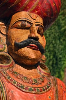 Indian folk art wooden sculpture of maharadja