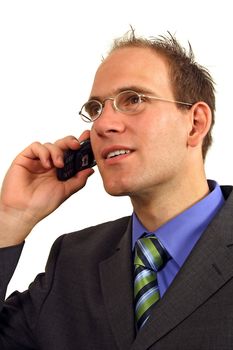 A smarting businessman gets news via his mobile phone. All isolated on white background.