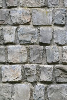 A nice texture of a massive stone wall. Useful as background.