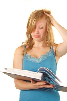 A young ambitious student reading. All isolated on white background.