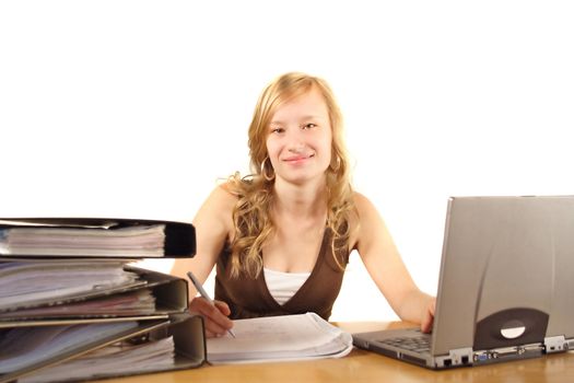 A young smarting woman at her workplace. All isolated on white background.