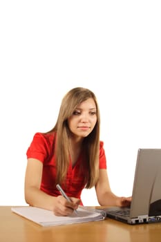 A young handsome woman working concentrated. All isolated on white background.