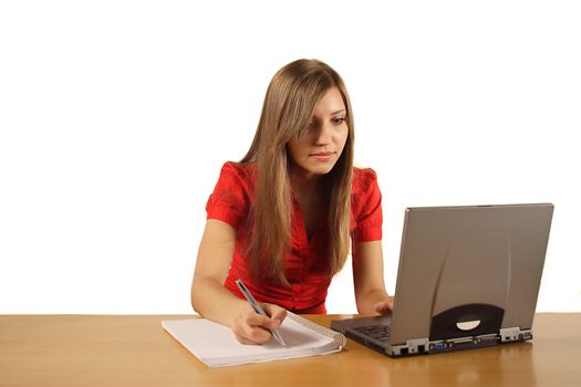 A young handsome woman working concentrated. All isolated on white background.