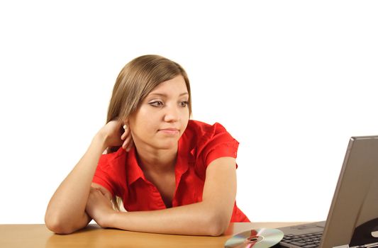 A young handsome student waiting for the installation process of her notebook computer. All isolated on white background.