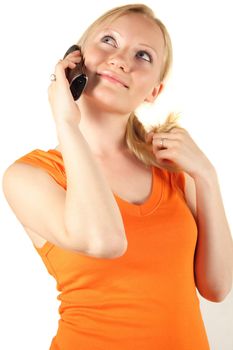 A young handsome woman on the phone. All isolated on white background.